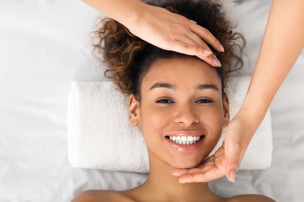 Woman Receiving a Facial. Start Your Aesthetics Training this Winter at ClaraDerma+